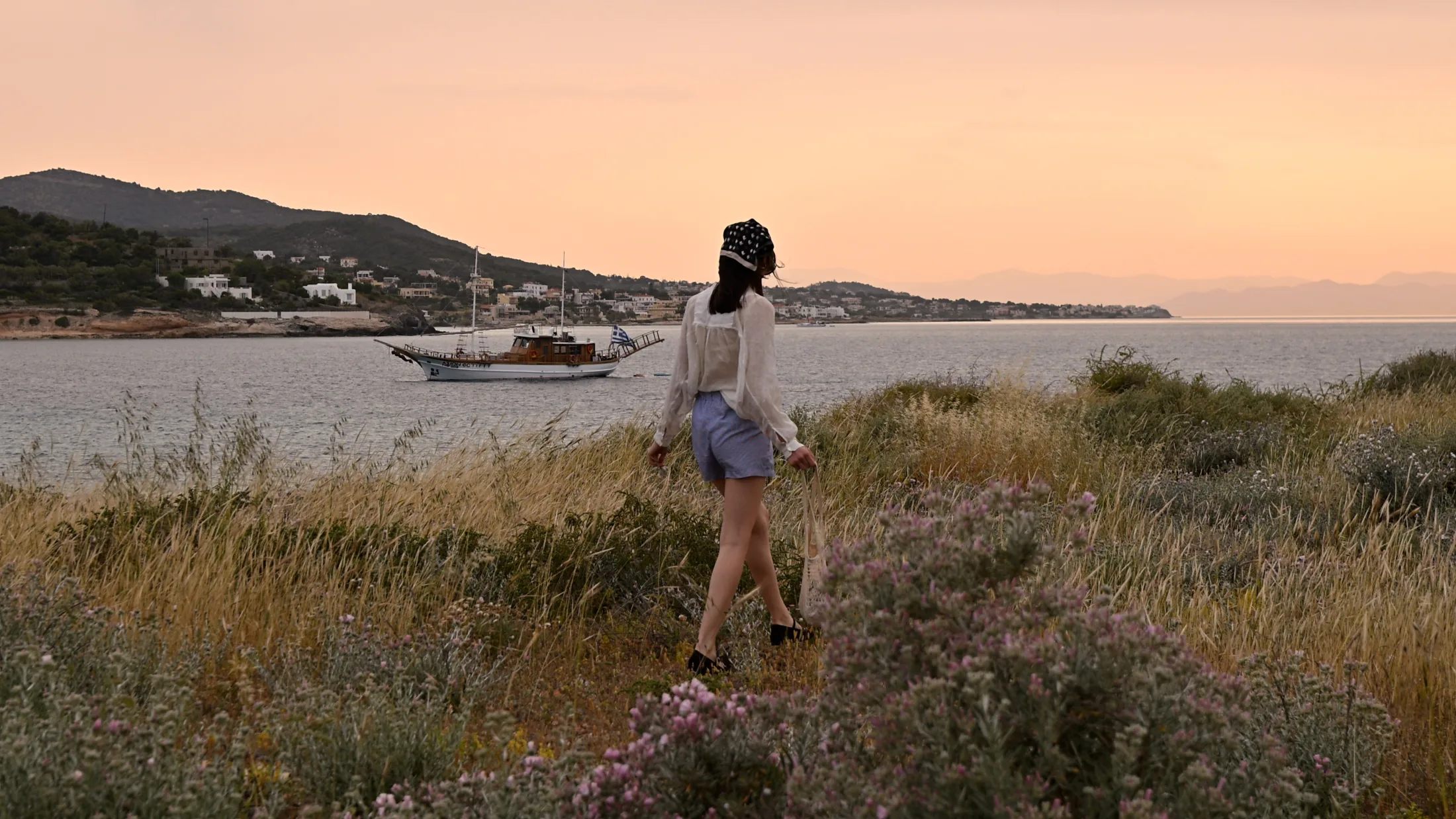 AXION ESTI cruising along the Athenian Riviera