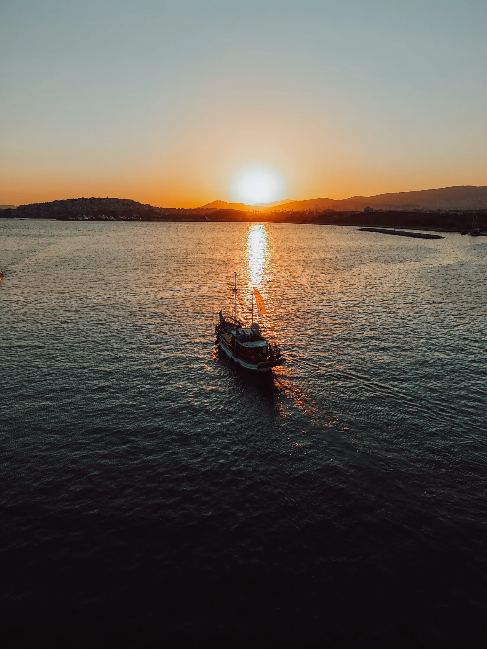 AXION ESTI sailing at sunset in the Saronic Gulf
