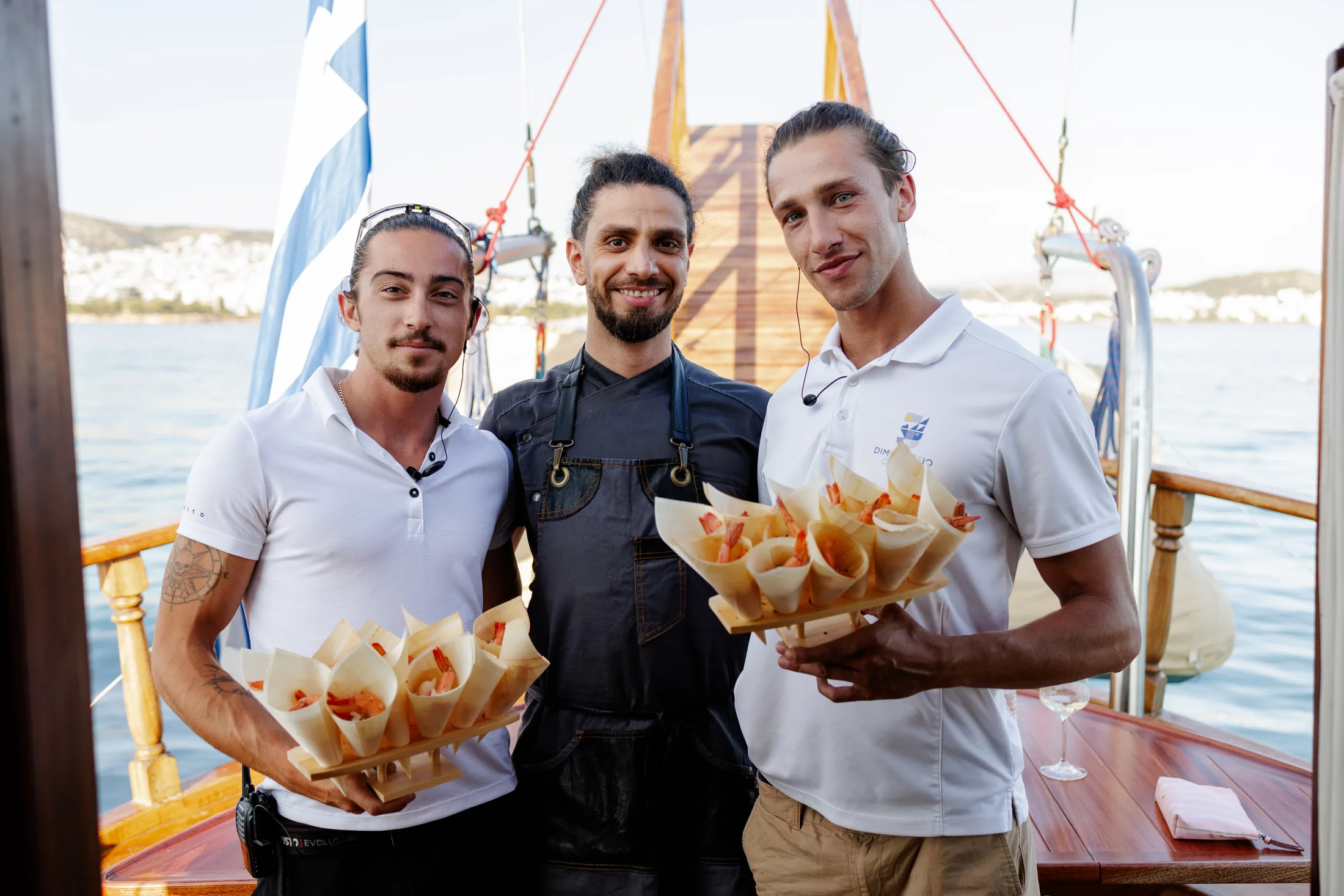 Corporate guests aboard AXION ESTI during a private yacht event in Athens