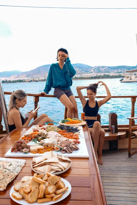 Guests aboard AXION ESTI during a private cruise from Athens