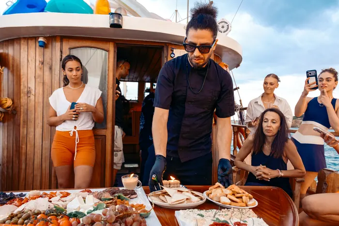 Guests aboard AXION ESTI during a private cruise from Athens